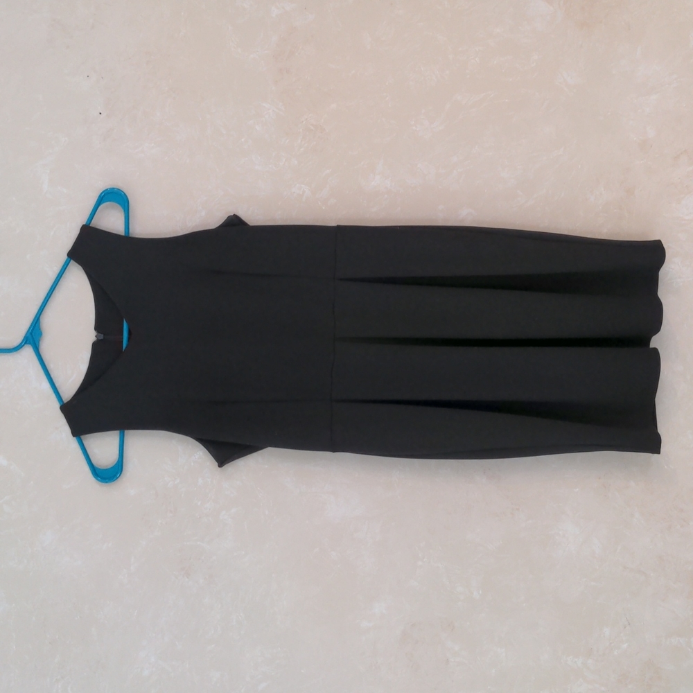 Pleated black dress from the Mediterranean